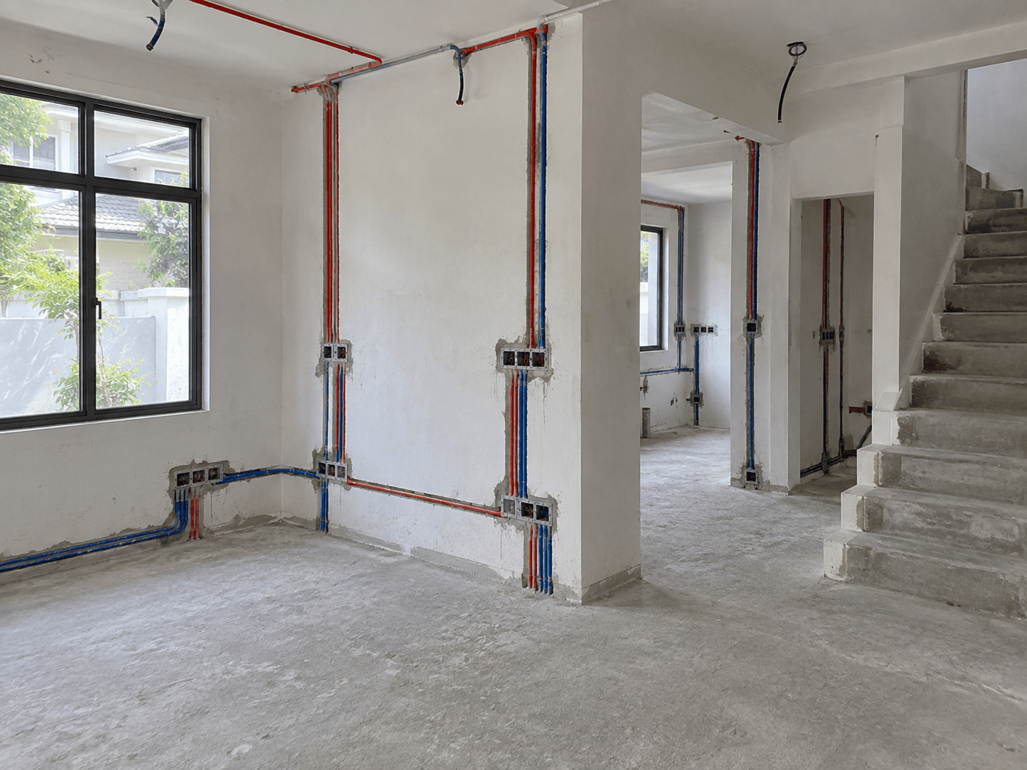 Illustrative renovation site showing electrical first-fix work